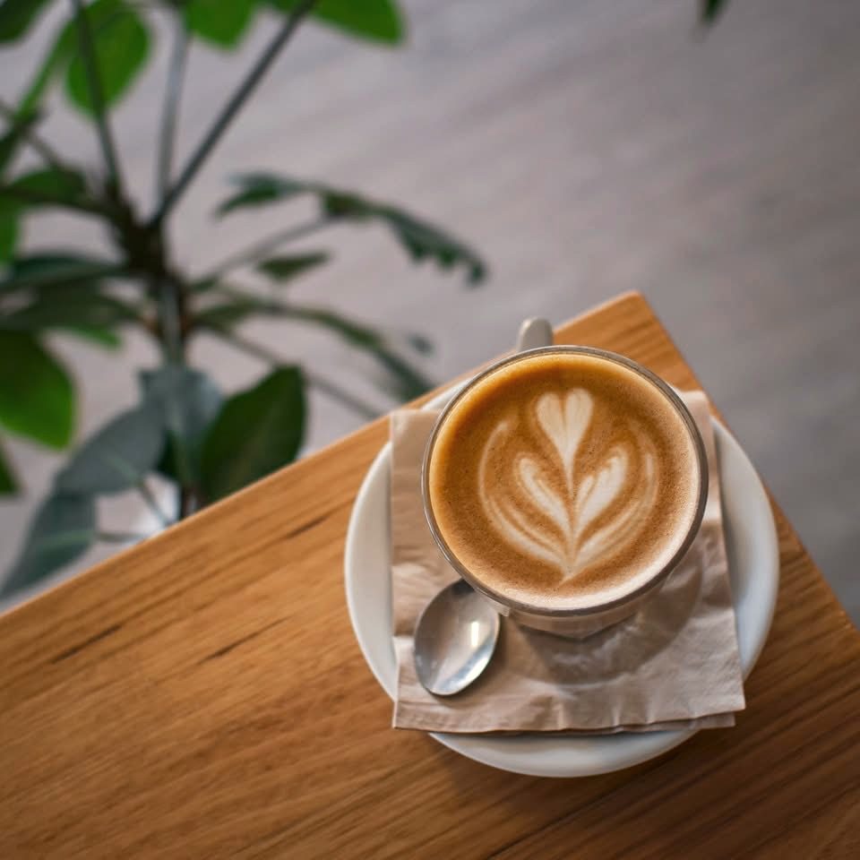 A latte on its saucer at Oar